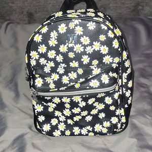 Justice Mini Backpack w/color changing daisies